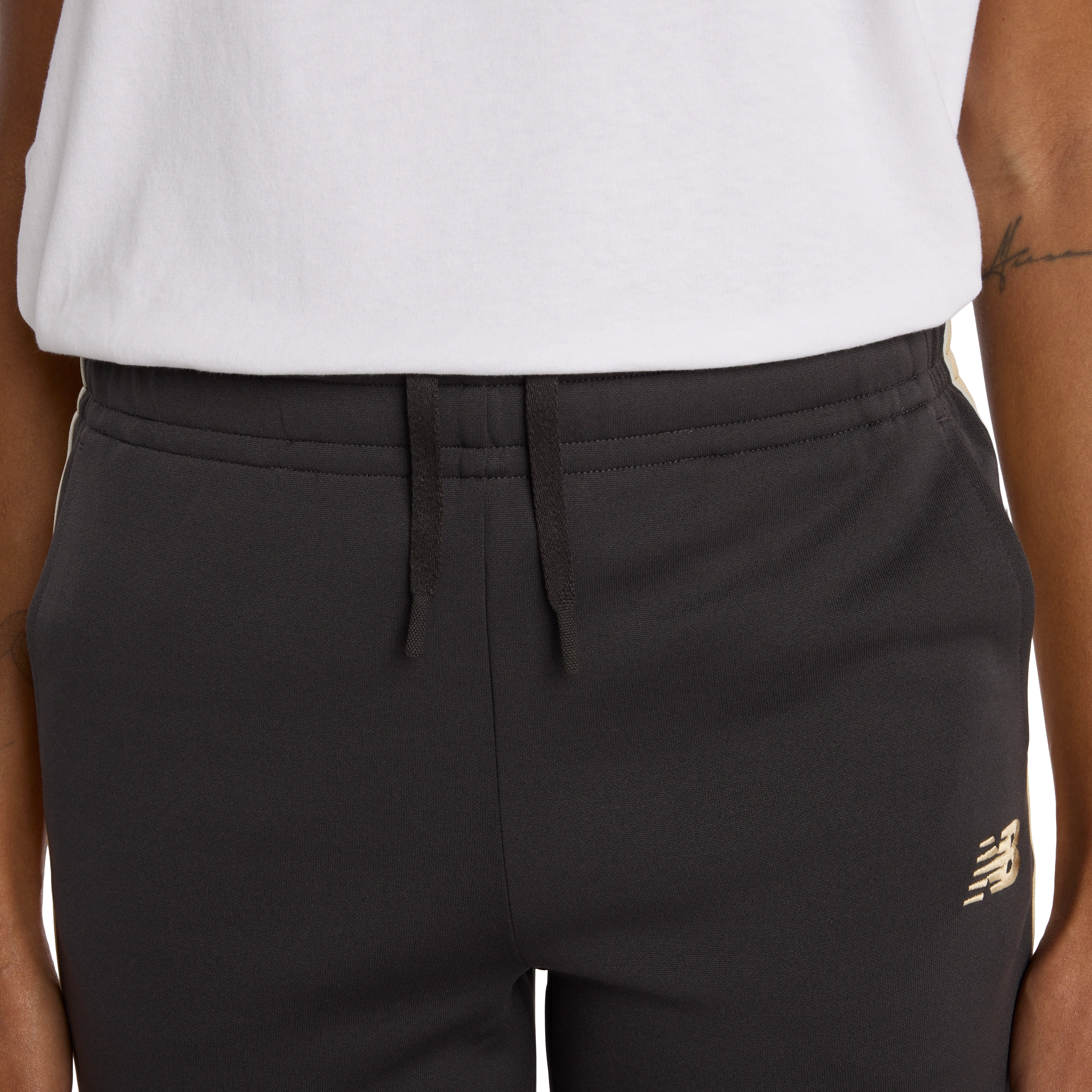 New Balance - WB61Q2R4ABR - Női melegítő nadrág